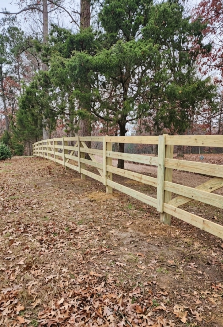 Wood post and rail fence